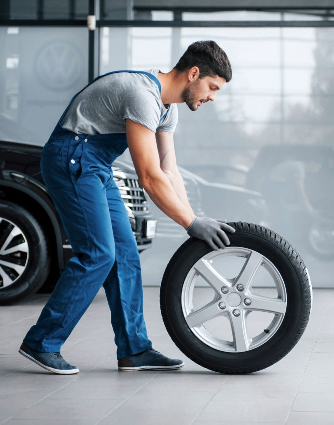 Man moving tire info-1